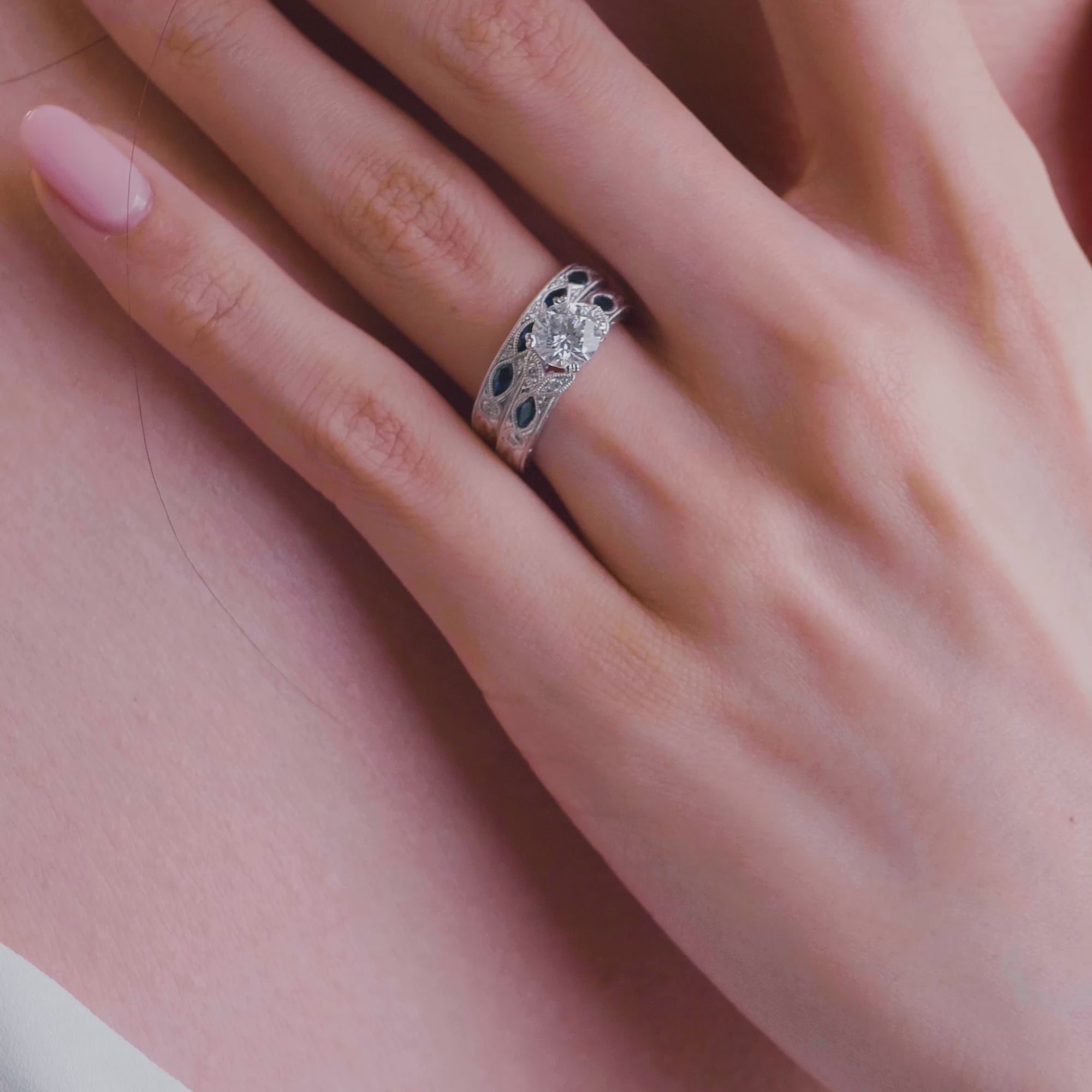 Video of Kirk Kara White Gold Dahlia Marquise Shaped Blue Sapphire Diamond Engagement Ring And Band on model