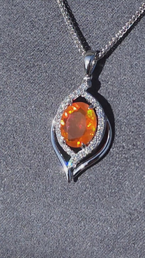 Video of the Simon G. Mexican Fire Opal Halo Diamond Swirl Pendant